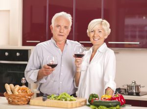 senior couple with wine landscape
