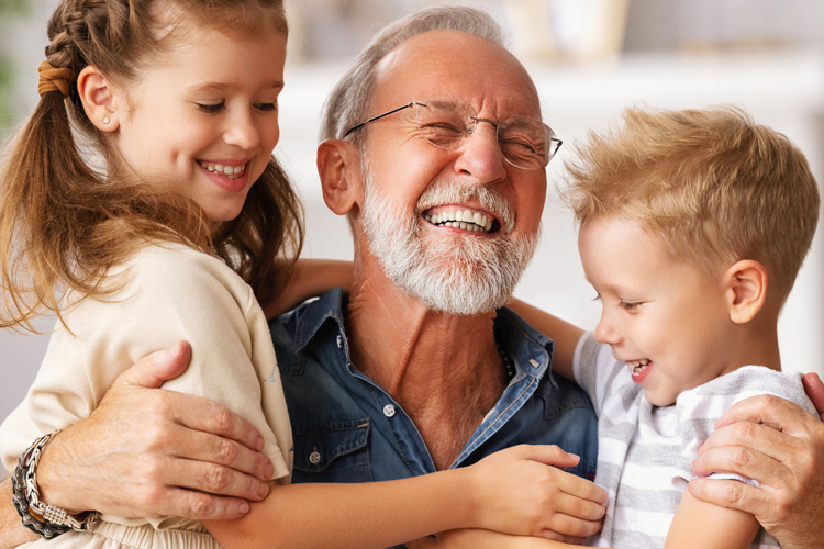mullen residences senior man with grandchildren