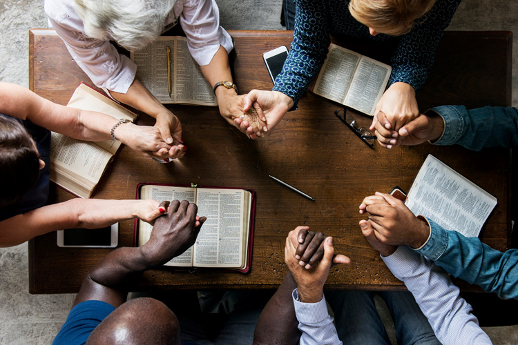 mullen residences overhead view of group bible study