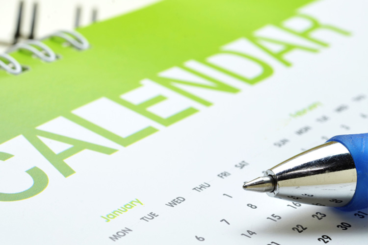 mullen residences pen sitting on calendar