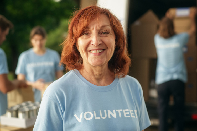 mullen residences senior woman volunteering