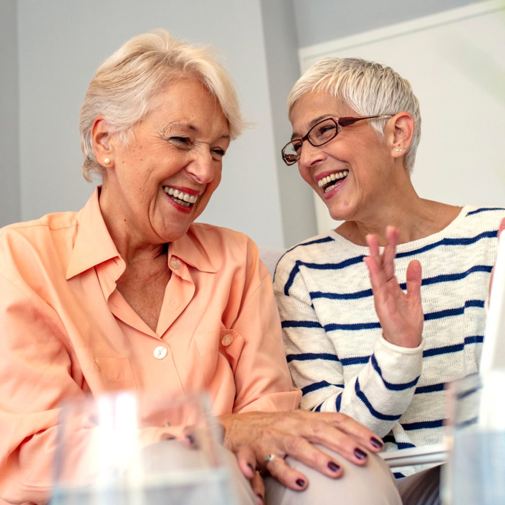mrh two women friends laughing
