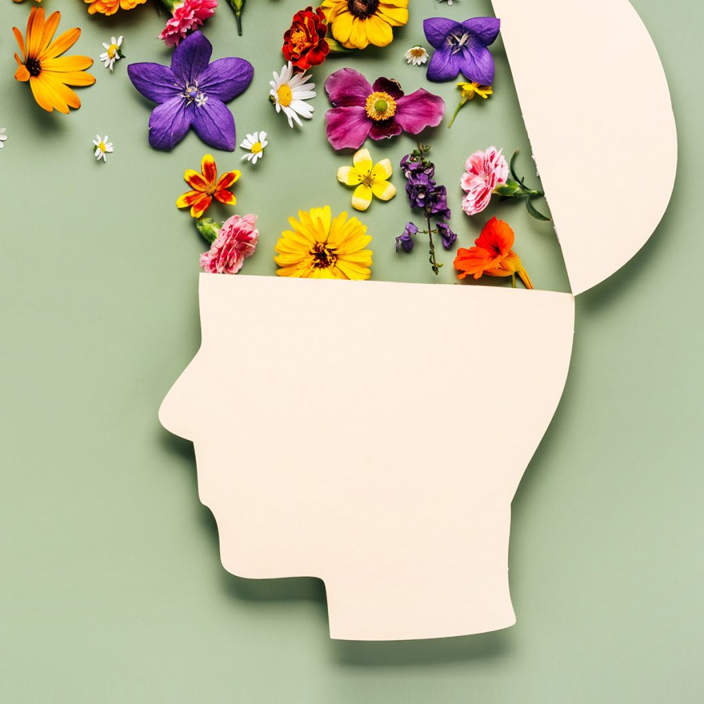 mullen residences head shape with top open and flowers coming out
