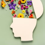 mullen residences head shape with top open and flowers coming out