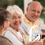 mrh three senior adults enjoying wine