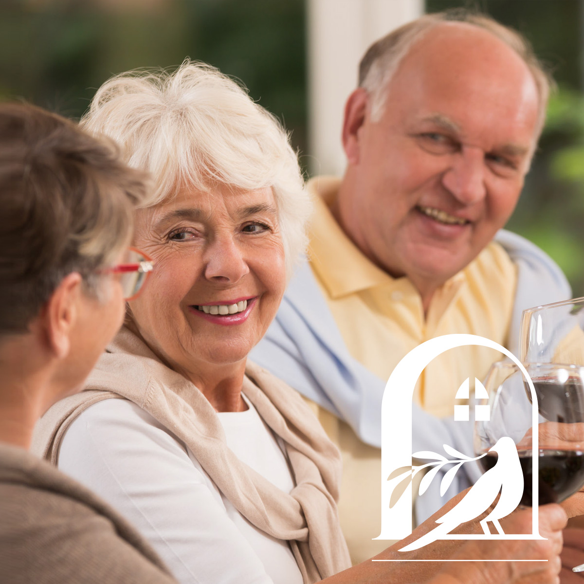mrh three senior adults enjoying wine
